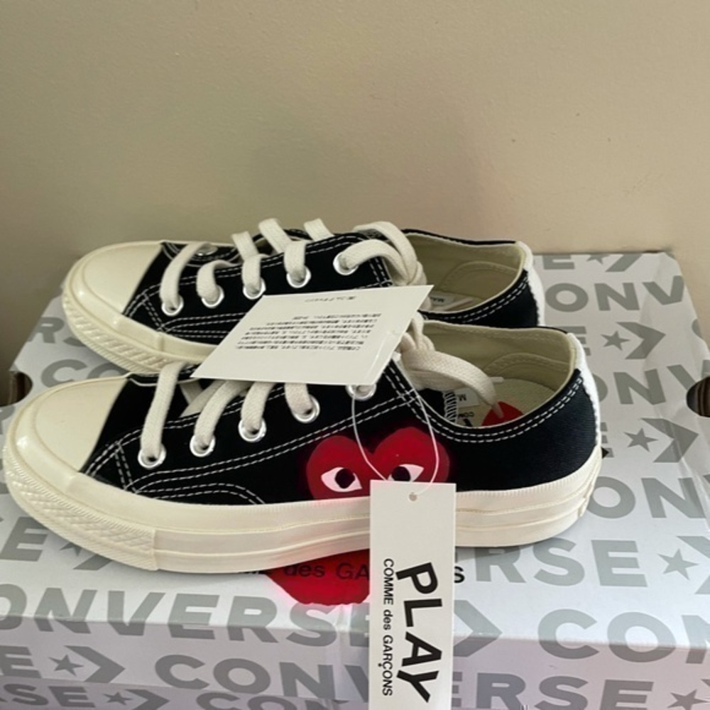 NIB Comme des garçon low top black converse
steady seller 
Size: women 5.0